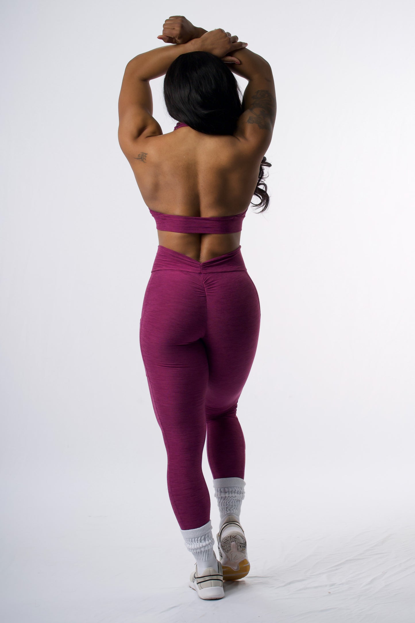 Purple halter sports bra leggings set.